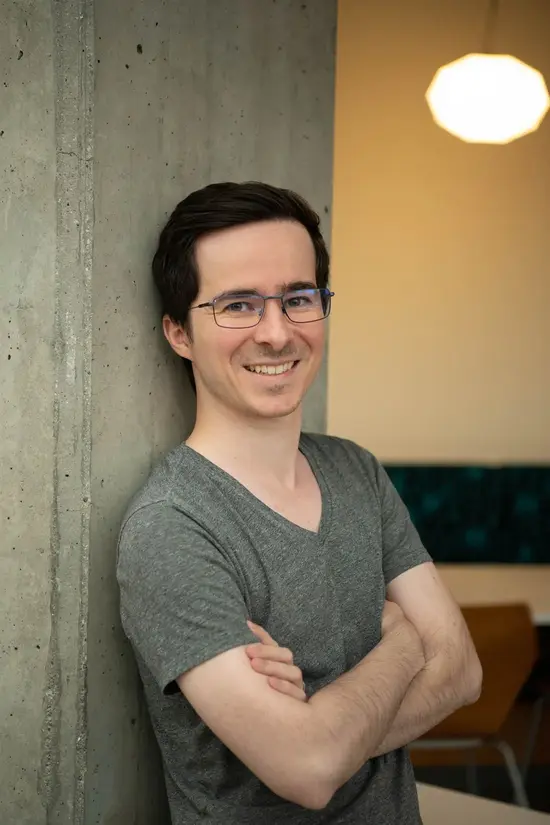 Etienne Baudoux, founder of Veler, LLC, smiling with arms crossed